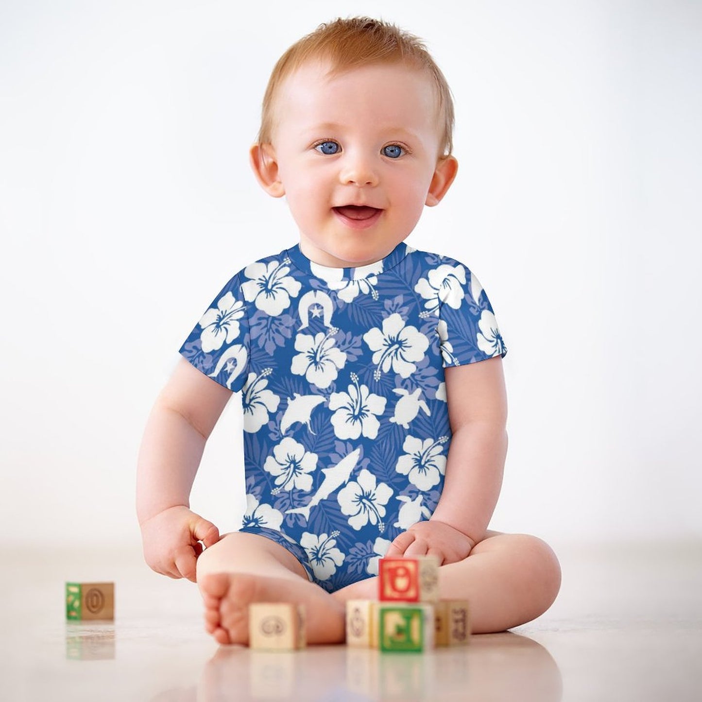 White hibiscus flowers with Dhari, Shark, turtle, and stingray (Blue) on Faux Cotton Short Sleeve Baby Bodysuit Romper