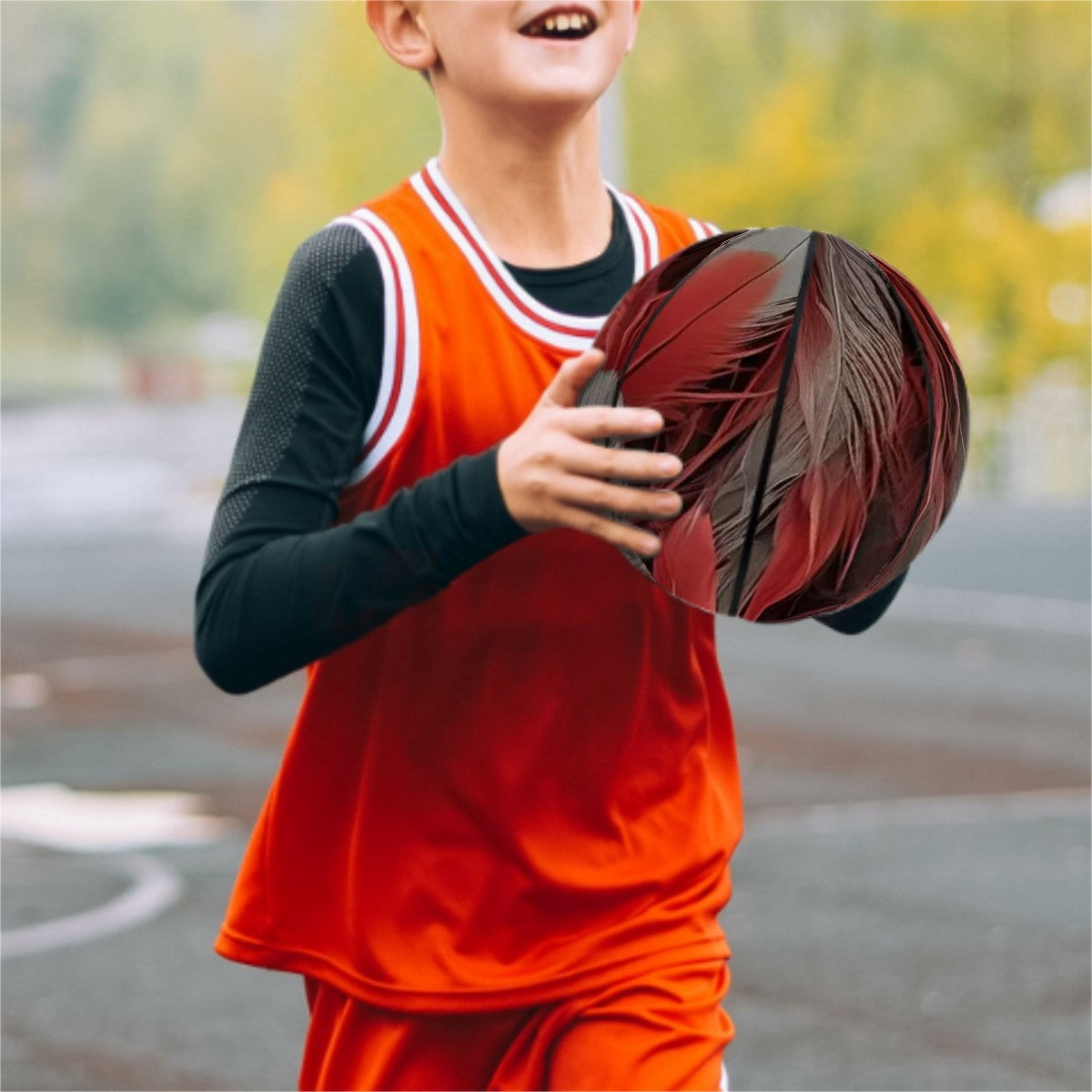 Red and Grey Feather on Basketball