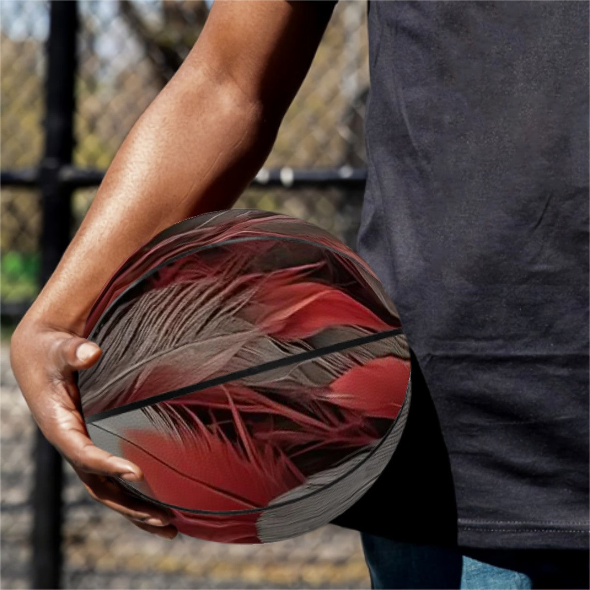 Red and Grey Feather on Basketball