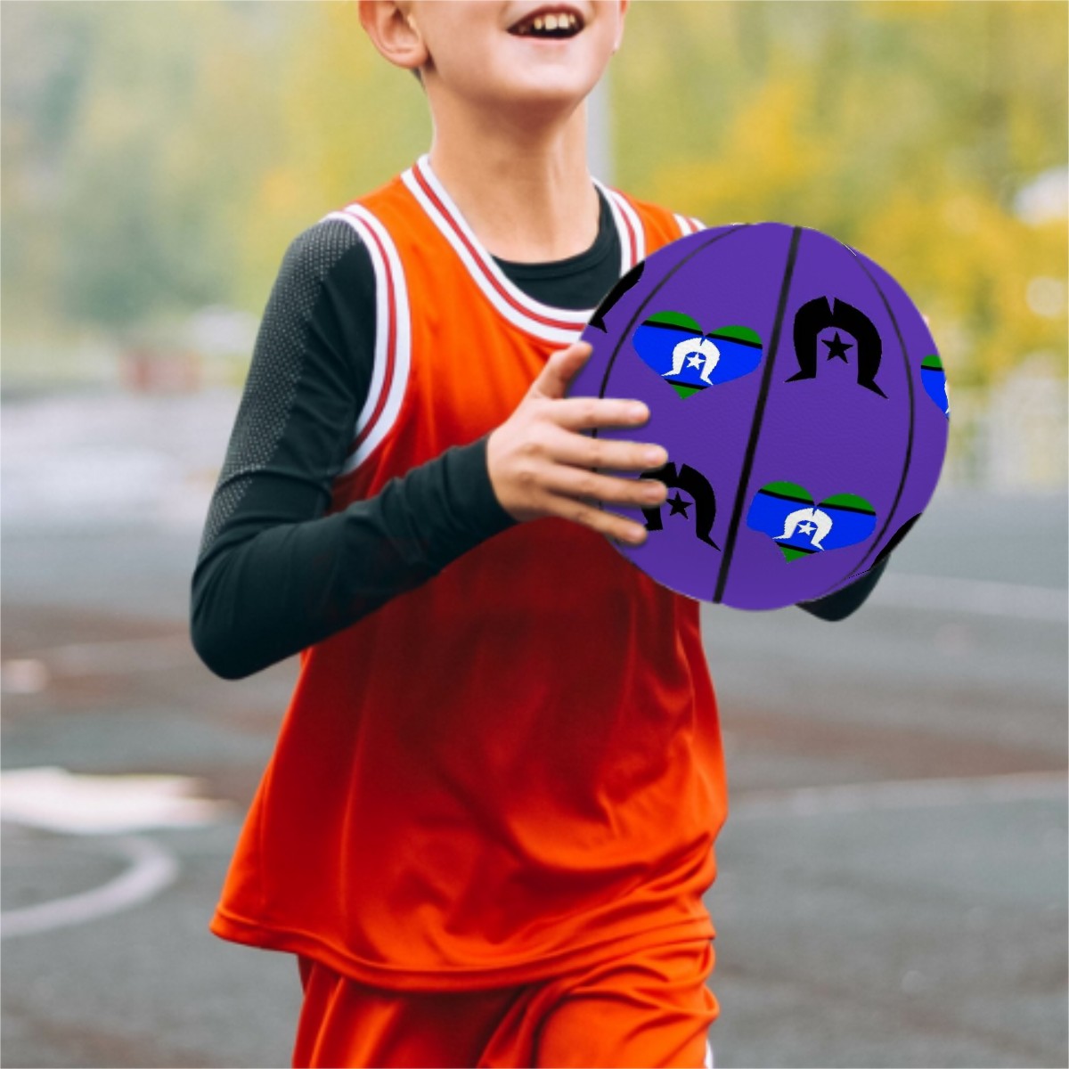 Heart shaped Torres Strait Flag and Black Dhari on Basketball