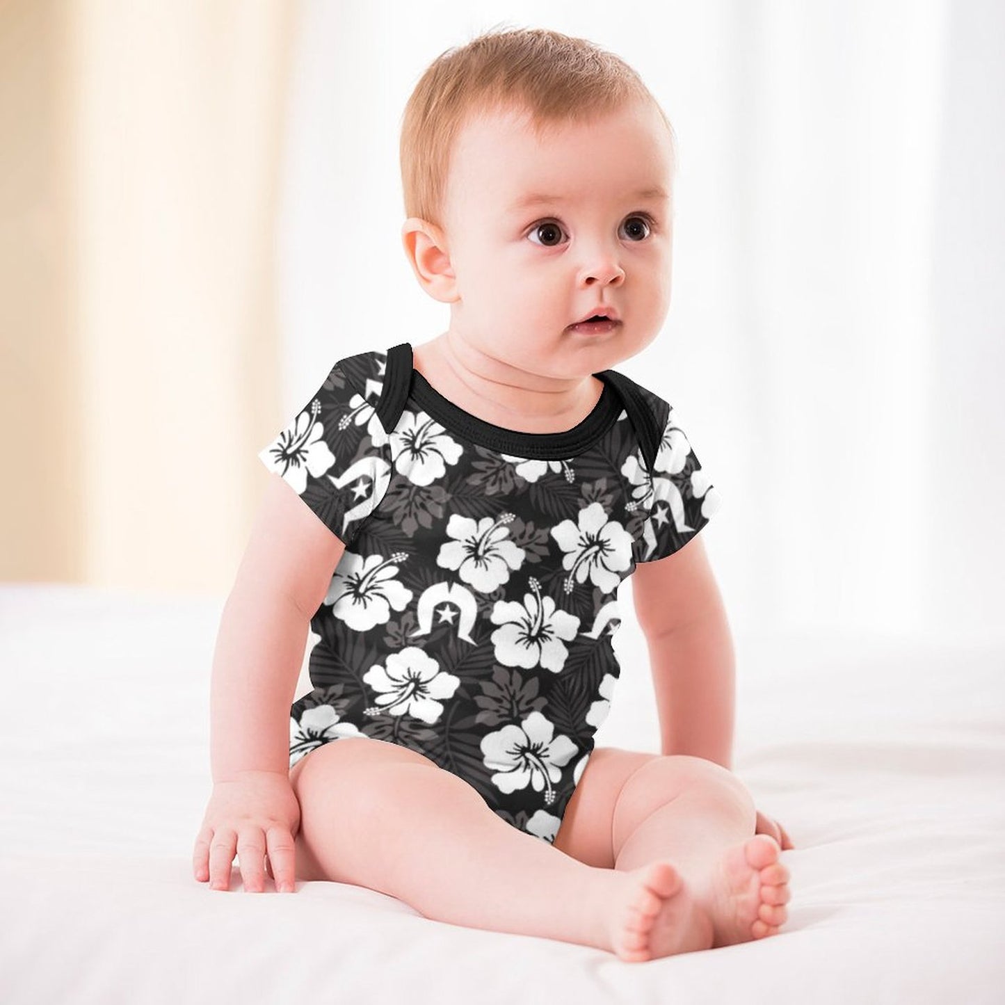 White Hibiscus and Dhari (Black) on Faux Cotton Short Sleeve Baby Romper