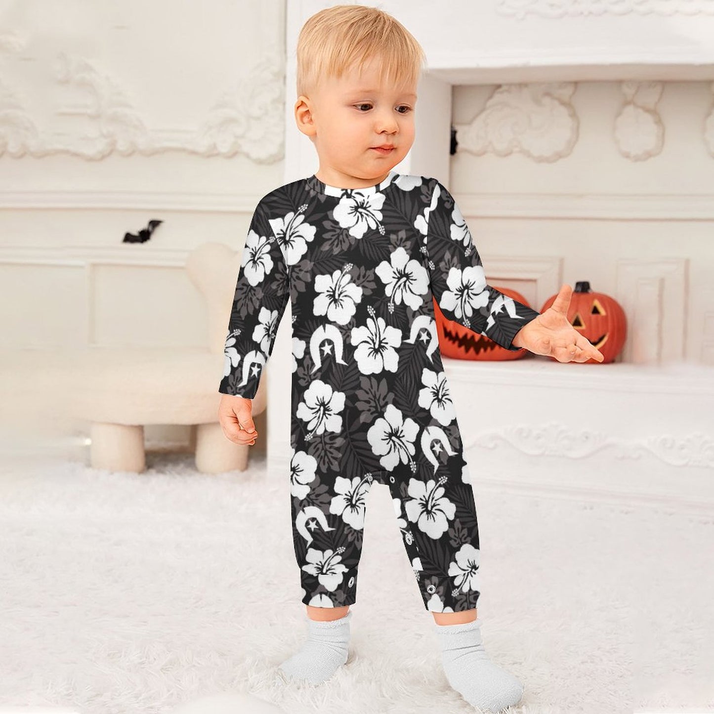White Hibiscus and Dhari (Black) on Baby Romper