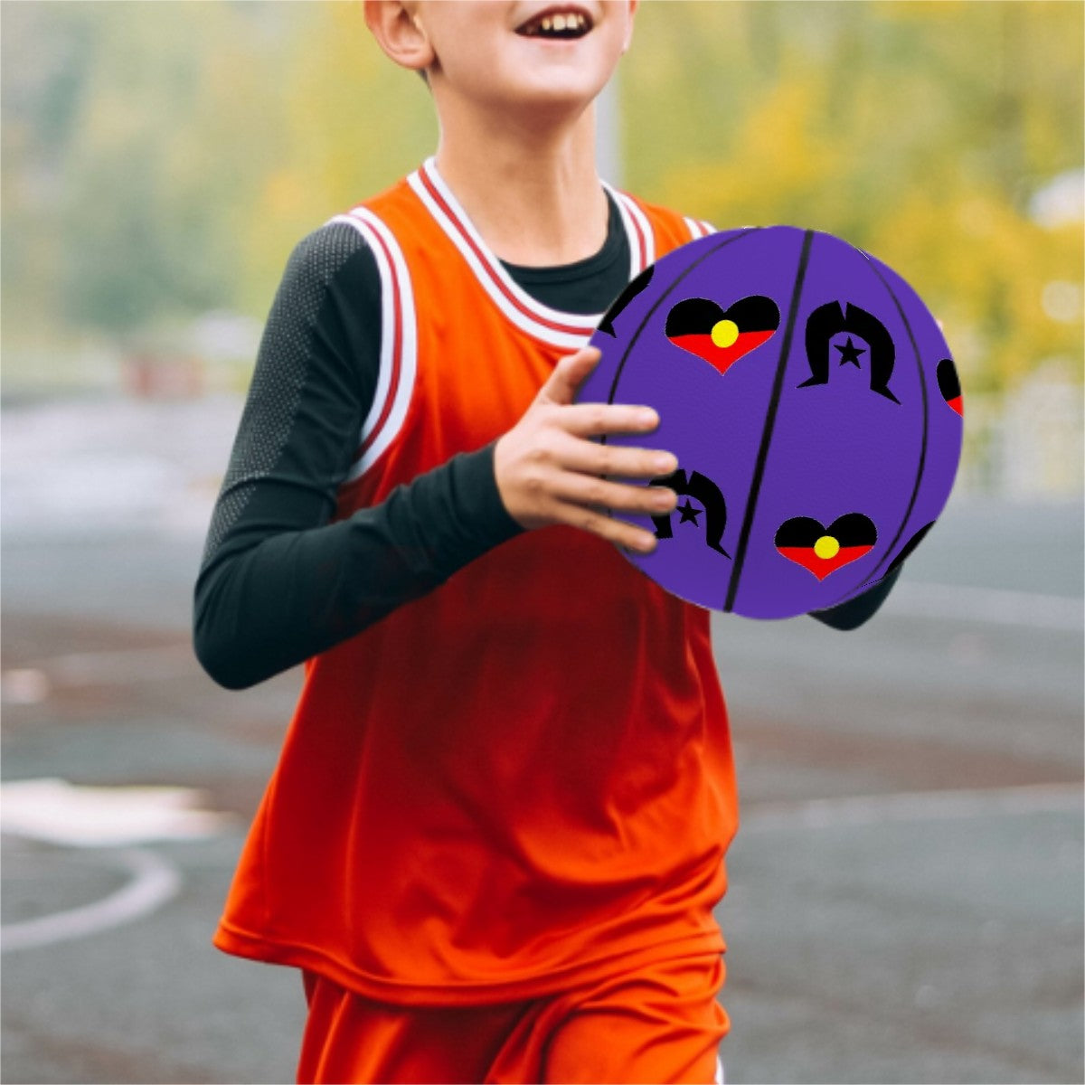 Heart shaped Aboriginal Flag with Black Dhari on Basketball